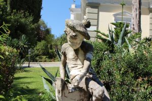 Achilleion Palace, Gastouri, Corfu Island, Greece - August 1, 2017:  Small sculpture in the Achilleion Palace, Corfu. The Achilleion Palace can be found in the village of Gastouri, 10 km south west of Corfu Town