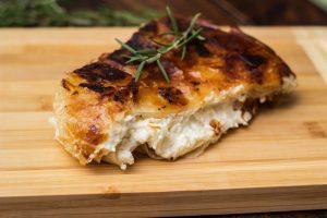 The pie is baked until the crust is golden and crispy