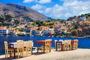 Traditional Greece - small street tavernas in Symi island, Dodecanesse