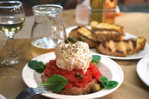 Greek and Cretan salad dakos,in Italy bruschetta